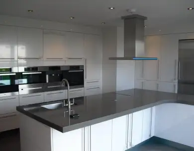 Luxury contemporary kitchen with bespoke island and integrated appliances in Chigwell Essex
