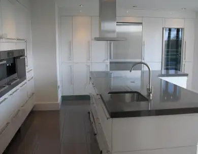 Luxury modern kitchen with bespoke island and integrated appliances in Chigwell Essex