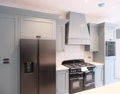 Luxury bespoke kitchen renovation with shaker cabinets and range cooker in Loughton Essex