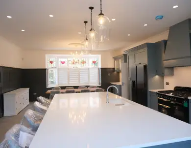 Luxury open plan kitchen with large island and bespoke cabinetry in Loughton Essex