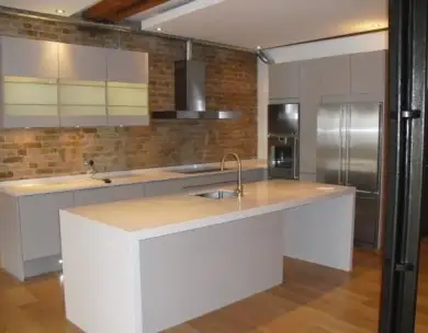 Luxury industrial style kitchen refurbishment with exposed brickwork in Loughton Essex