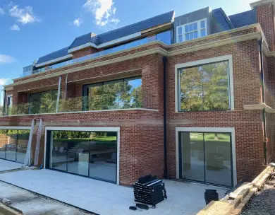 Luxury modern residential development with large glazing and outdoor terrace in Chigwell Essex