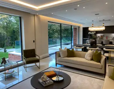 Luxury open plan living room and kitchen with garden views in Chigwell Essex