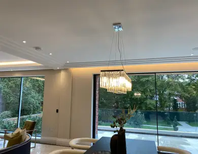 Luxury open plan dining area with panoramic garden views in Chigwell Essex