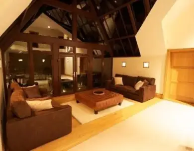 Luxury vaulted living room with bespoke timber glazing in Chigwell Essex