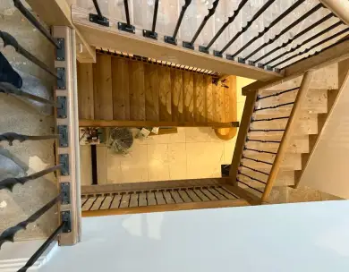 Luxury staircase void view with oak staircase and bespoke balustrades in Epping Essex