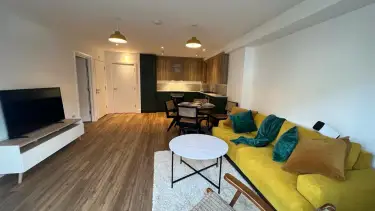 Modern open plan living area and kitchen in Leytonstone flat conversion London
