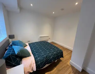 Modern bedroom interior in Leytonstone shop to flat conversion London