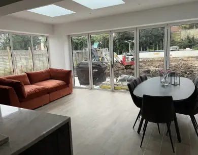 Modern open plan dining extension with large sliding doors in Loughton Essex