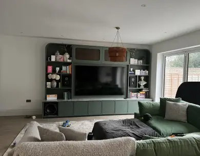 Modern living room with bespoke media unit and open-plan design in Loughton Essex
