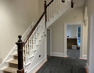 Luxury hallway and staircase renovation with traditional balustrade in Loughton Essex