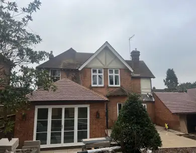 Luxury rear house extension with patio doors and brickwork construction in Loughton Essex