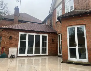 Luxury rear extension with patio area and bifold doors in Loughton Essex