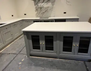 Luxury bespoke kitchen island installation with shaker cabinetry in Loughton Essex