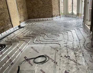 Underfloor heating installation and floor preparation in residential renovation project in Loughton Essex