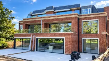 Large house extension project in Chigwell with brickwork, glazing and balcony details
