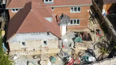 Aerial view of a house extension project under construction in Epping