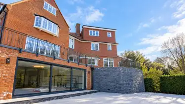 Large house extension project in Loughton with brickwork, glazing and terrace details